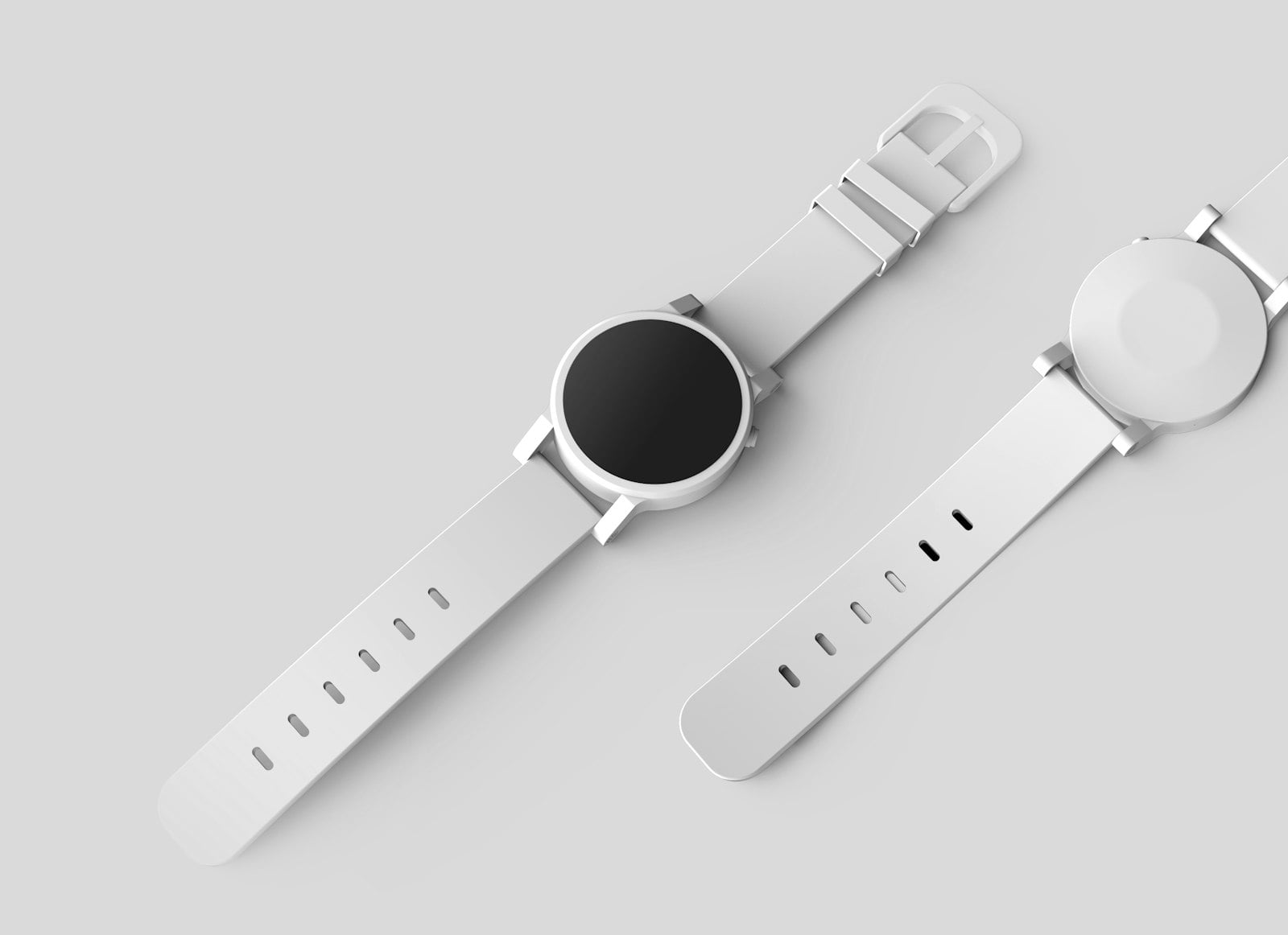Two plain white watches on a light grey surface (photo: Rachit Tank / Unsplash)